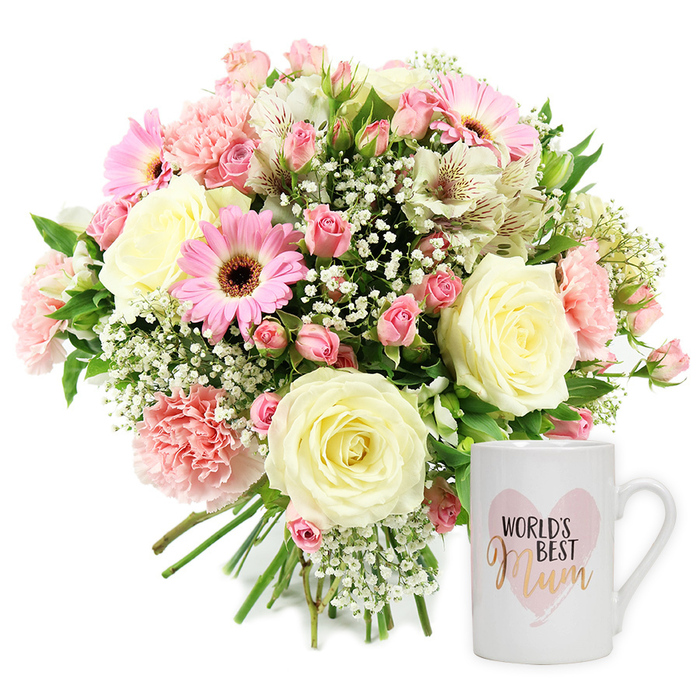 A beautifully composed Mother's Day gift set is displayed against a spotless white backdrop, highlighting every nuance of colour and texture. To the left, a full, rounded bouquet rests with its stems neatly gathered, as though just finished on a workbench in a Clerkenwell flower studio. The arrangement is built around creamy roses, their petals unfurling in soft spirals, with hints of pale yellow at the base that gently fade to ivory at the tips. Intertwined with these are pale blush carnations, each flower a small explosion of ruffled petals that bring a rich, tactile depth to the design. Scattered among them, vibrant pink gerbera daisies with striking dark brown centres act like exclamation points of joy, drawing the eye and infusing the bouquet with a sense of fun and celebration that would brighten any home from Farringdon Road to Old Street. White alstroemeria blooms, long-petalled and gracefully marked with fine reddish-brown streaks, lend an elegant, almost painterly detail, while feathery clusters of white gypsophila float throughout the bouquet like tiny clouds, softening the overall shape and giving the impression of lightness. Pockets of fresh green foliage emerge here and there, offering a natural contrast that makes the pastel shades sing. The stems are clearly visible at the base, aligned in a way that reveals the bouquet's hand-tied craftsmanship. To the right, a pristine white ceramic mug stands prominently. On its front, a delicate, watercolour-style pink heart is printed, providing a gentle wash of colour. Inside this heart, the words WORLD'S BEST appear in crisp black capitals, while the word Mum is written beneath in a flowing, metallic gold or rose-gold script, catching the light with a subtle gleam. The clean, modern handle suggests comfort and everyday use, turning the mug into a keepsake that will outlast the flowers. Together, the bouquet and mug create an image filled with warmth and gratitude, perfectly suited to honouring a mother in Clerkenwell on Mother's Day, her birthday, or any occasion that calls for a heartfelt thank you.