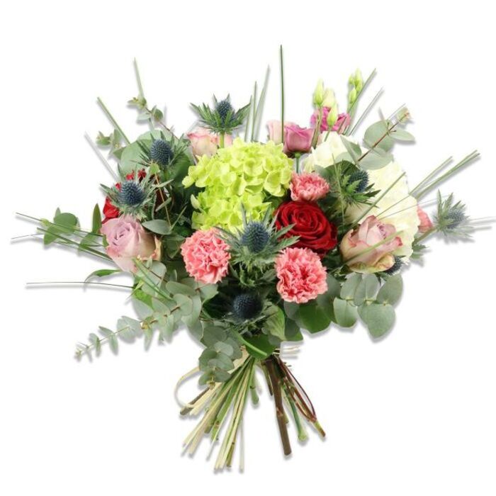A richly textured, hand-tied bouquet photographed on clean white to highlight its lively palette and artisanal construction. Dominating the centre is a large, luminous lime-green hydrangea whose dense clusters of petite petals create a soft, cumulus-like mass. Nestled into and around that central bloom are several roses: deep crimson varieties whose velvety petals are still tightly furled, counterbalanced by blush-pink and cream roses that relax into more open, romantic cups. The arrangement is enlivened by coral-pink carnations, their fringed, ruffled petals adding an inviting plushness and a sunlit warmth.

Adding structure and a cool twist are multiple blue-grey Eryngium (sea holly) thistles with spiky, star-shaped heads that pick up the light and introduce an almost metallic sheen. A generous palette of greenery - rounded, silvery eucalyptus leaves that provide a modern aromatic base and slender, upright green blades that create vertical rhythm - fills the spaces and lends breathability to the silhouette. The stems are gathered by hand and secured with a natural fibre tie, the visible green stems and occasional woody bits speaking to careful cutting and handling.

Seen in soft, natural daylight the bouquet feels both joyful and refined, suitable as a centrepiece for a celebratory meal or a considered gift for Mother's Day, an anniversary, or a birthday. I imagine it arriving at a Clerkenwell townhouse after a morning at Smithfield Market, the eucalyptus scent drifting through the hall and offering a quiet, green welcome that speaks of neighbourhood care and floral craftsmanship.