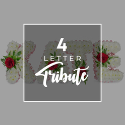Evoking the quiet streets and old stone churches around Clerkenwell, this image presents a dignified four-letter funeral tribute arranged with a craftsman's eye. Four individual floral letters, upright and substantial, are formed entirely from tight clusters of white chrysanthemums, each blossom pressed closely to the next until the surface appears almost like soft, woven fabric. Along the edges of every letter runs a narrow band of pale pink ribbon or fabric, its delicate colour only just visible beneath the white petals, adding a gentle, reassuring warmth. Dotted across the letters are deep red roses in full bloom, their spiral centres rich and velvety, surrounded by sprigs of lush green foliage that introduce movement and natural texture. These touches of crimson and green give the arrangement emotional weight, symbolising love, respect, and remembrance. At the heart of the image, a semi-transparent dark grey square rests over the centre of the tribute, bordered by a crisp white frame that keeps the composition clean and modern. Through the tinted layer you can still make out the contours of the flowers beneath, especially the red roses that subtly glow through the grey. Across this central panel, in bright white lettering, the phrase "4 LETTER Tribute" is displayed, the numeral "4" bold and large at the top, "LETTER" simple and clear beneath, and "Tribute" written in an elegant script that arcs softly across the lower portion. The balance of muted grey background, fresh white flowers, and strong red accents captures the essence of a bespoke memorial arrangement one might order for a funeral service or wake in Clerkenwell, honouring a loved one with understated beauty.