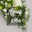 Today's offer from Clerkenwell Flowers presents a luminous white-and-green spray that blends clarity with calm, contemporary elegance. The arrangement fills most of the frame against a soft light-grey backdrop, with a dense core of pristine white hydrangeas creating a cloudlike mass at the heart of the display. Interwoven among them are classic white roses in varying stages of bloom, their velvet petals lending romance and refinement. Delicate white lisianthus with subtle green tinges rise and fall through the spray, adding sculpted lines that keep the eye moving. Generous greens surround the blossoms: feathery ferns lend texture and breeze, round grey-green eucalyptus softens the palette, and deeper ruscus leaves provide structure and contrast. Small clusters of light-green buds sparkle like fresh growth, finishing the garden-fresh impression. Centered in the image is a crisp white rectangular border, within which Florist Choice appears in an elegant script, followed by TODAY in a compact uppercase sans-serif, and then SPRAY beneath, all separated by slim lines. A bottom price is visible, anchoring the design as a tempting recent-purchase option. The overlay's gentle transparency lets the greenery peek through, a quiet reminder of the craft behind the arrangement. This Florist Choice Today spray is perfect for sympathy, sophisticated gifts, or a refined home centerpiece, and it's available for same-day delivery across Clerkenwell and the EC1 postcodes, including Farringdon, Exmouth Market, and nearby streets. It captures the spirit of this neighbourhood, where white blooms meet sharp green accents in a composition that feels both modern and timeless, a true reflection of Clerkenwell's careful, thoughtful floristry.